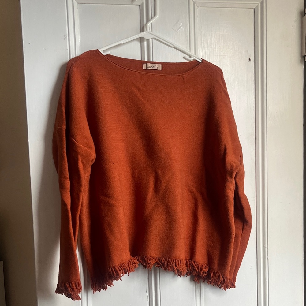 Orange Sweater with Fringe Hem